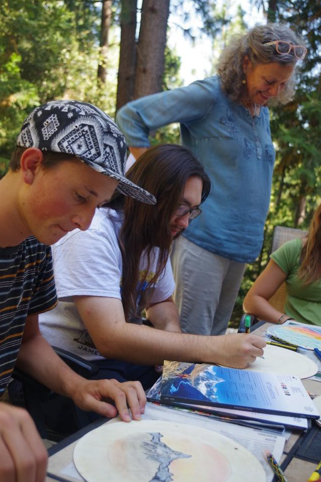 Artist Rene Sprattling offered input on artwork that harvests earth's rare beauty rather than its rare earth minable minerals. (Photo by Lily Ning)